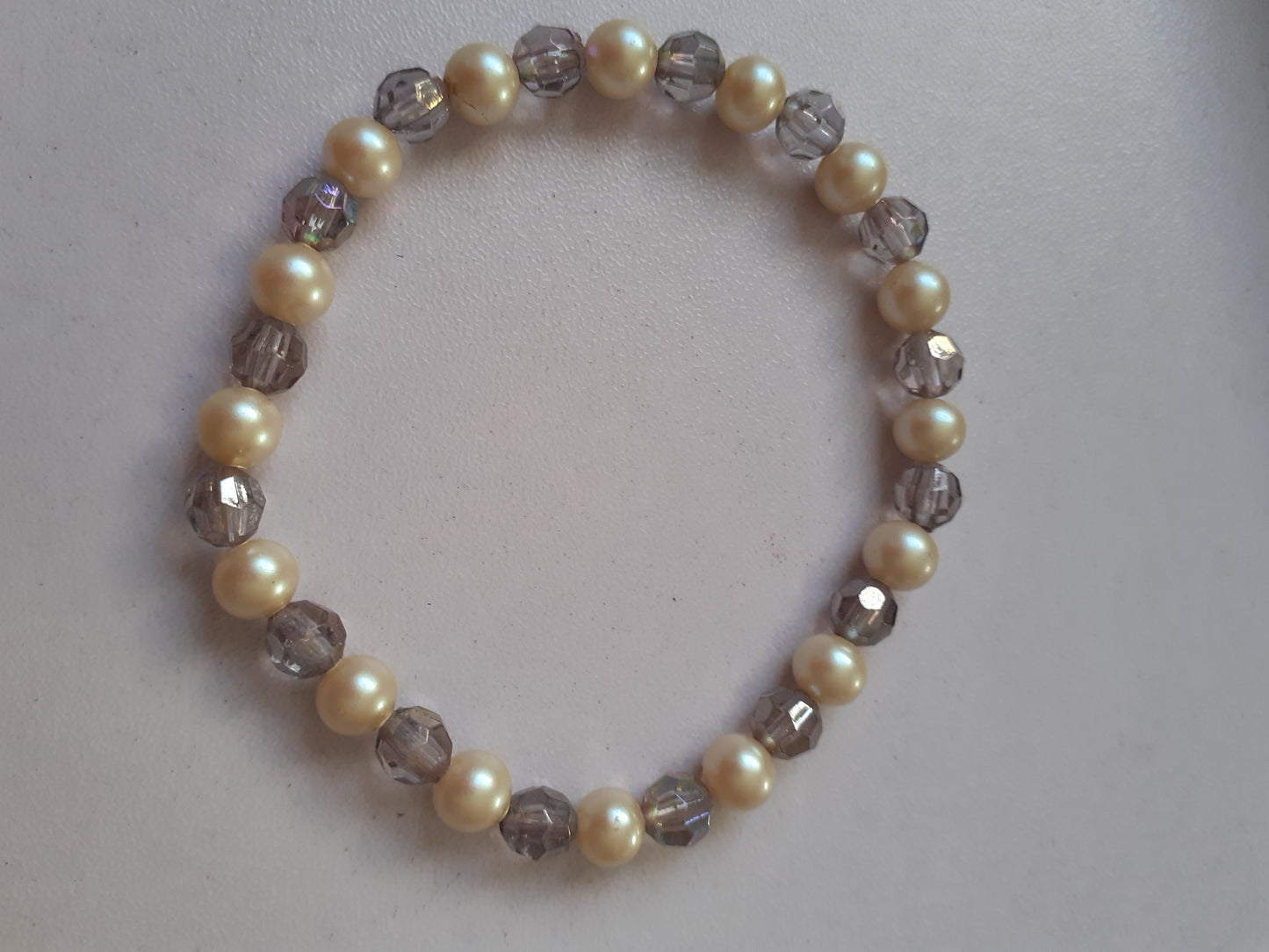 Pearl and metalic iridescent beads bracelets