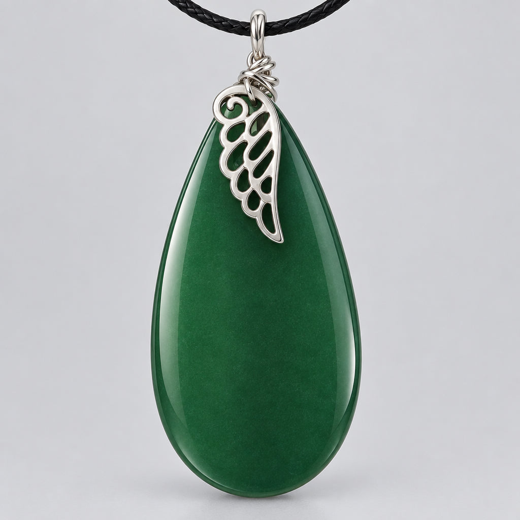 Green pendant with silver wing design on a light gray background